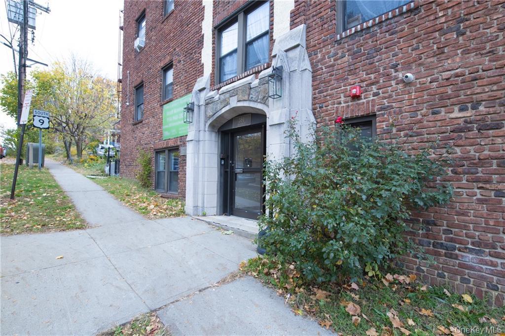 381 Broadway, Unit 1B Dobbs Ferry, NY 10522 - Photo 16 of 16 a front view of a house with garden