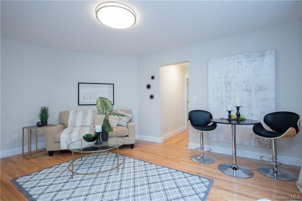 381 Broadway, Unit 1B Dobbs Ferry, NY 10522 - Photo 7 of 16 a living room with a couch