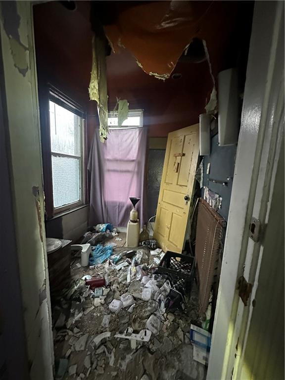 627 Chester Avenue Pittsburgh, PA 15214 - Photo 11 of 19 a bathroom with a sink a toilet and mirror
