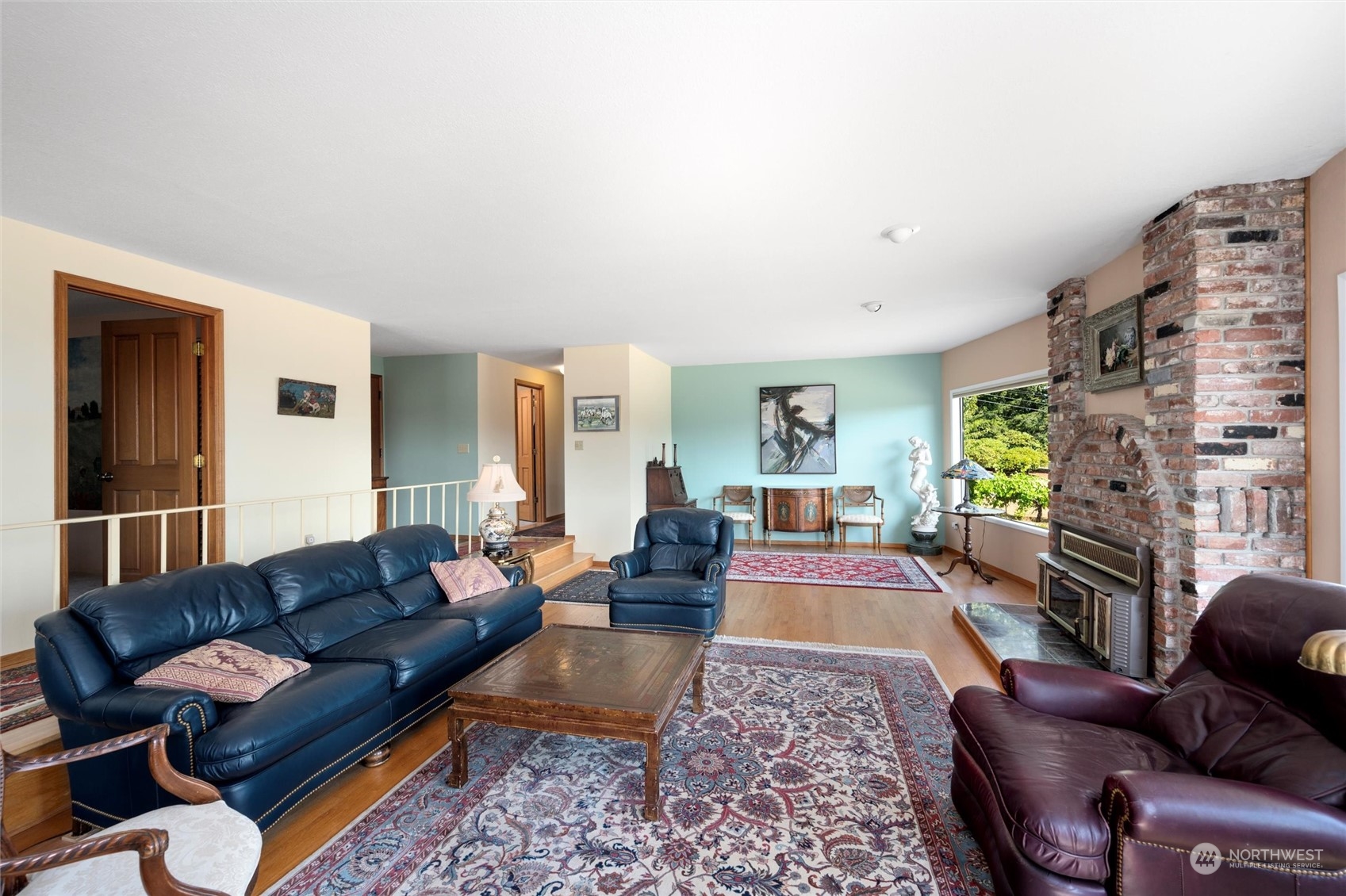 13622 Trumpeter Lane Mount Vernon, WA 98273 - Photo 11 of 40 a living room with furniture and a fireplace