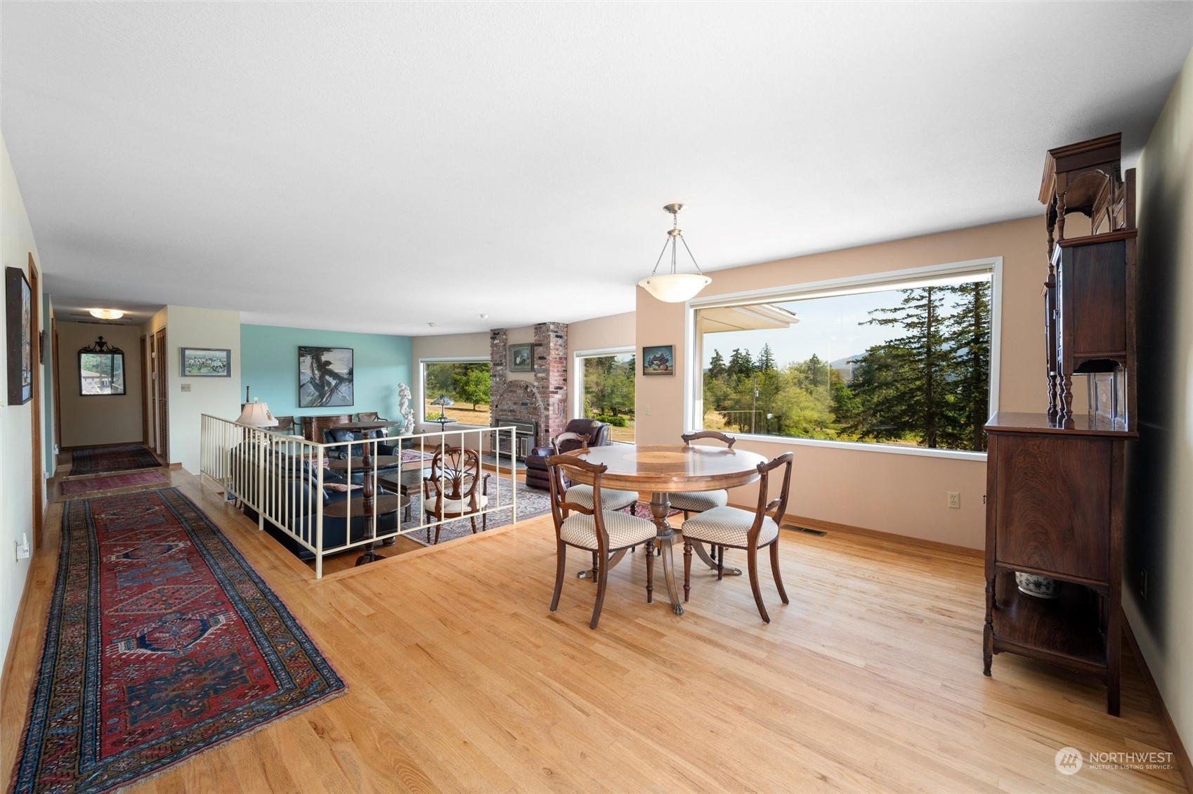 13622 Trumpeter Lane Mount Vernon, WA 98273 - Photo 12 of 40 a dining room with furniture window and wooden floor