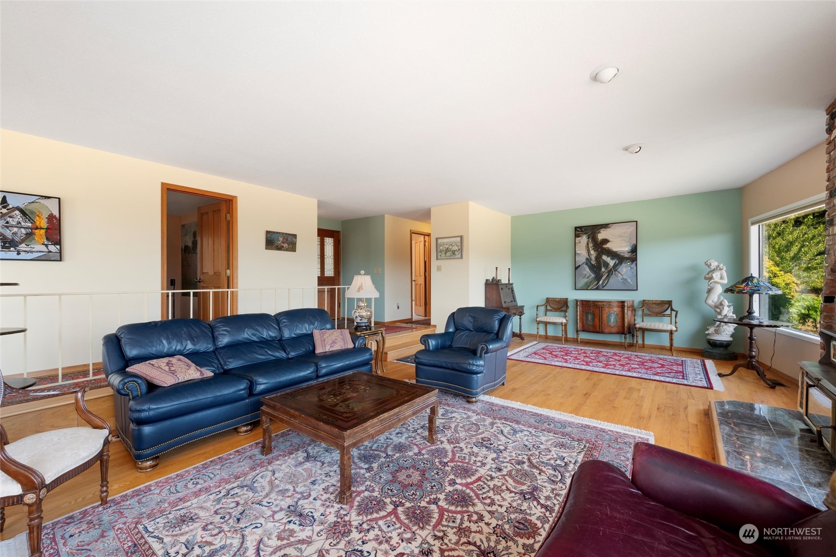 13622 Trumpeter Lane Mount Vernon, WA 98273 - Photo 13 of 40 a living room with furniture and a rug