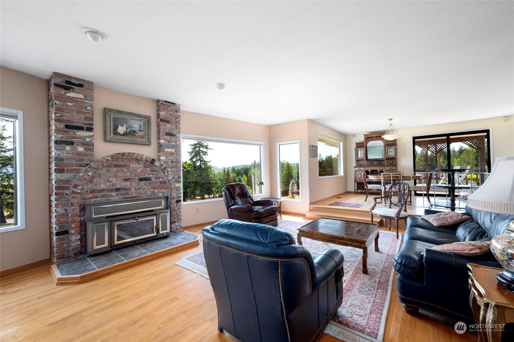 13622 Trumpeter Lane Mount Vernon, WA 98273 - Photo 14 of 40 a living room with furniture and a fireplace