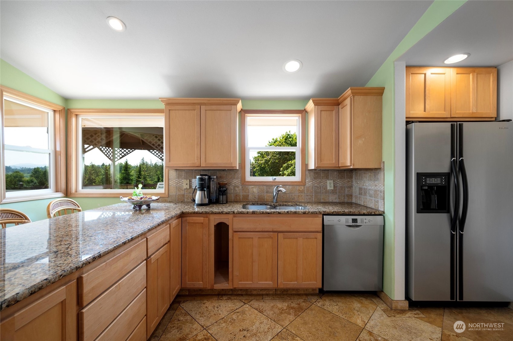 13622 Trumpeter Lane Mount Vernon, WA 98273 - Photo 21 of 40 a kitchen with a sink stove and refrigerator