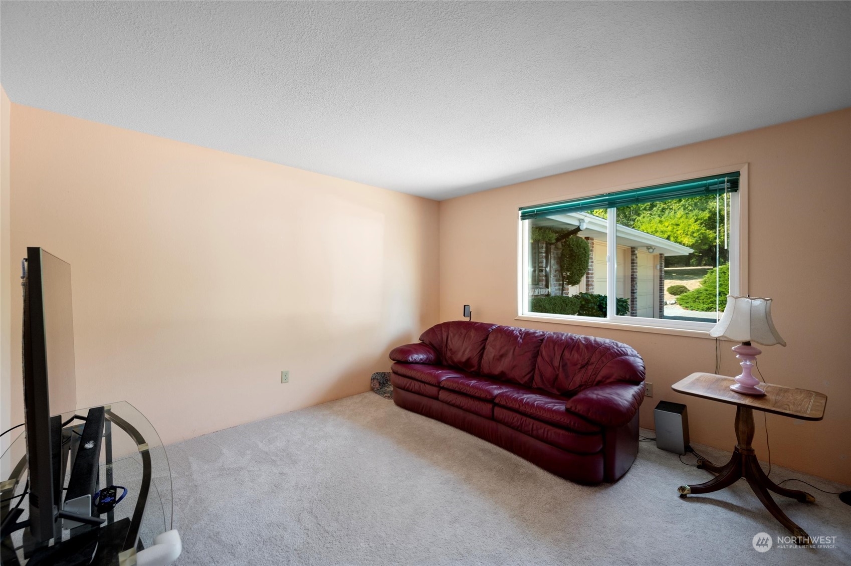 13622 Trumpeter Lane Mount Vernon, WA 98273 - Photo 24 of 40 a living room with furniture rug and a window