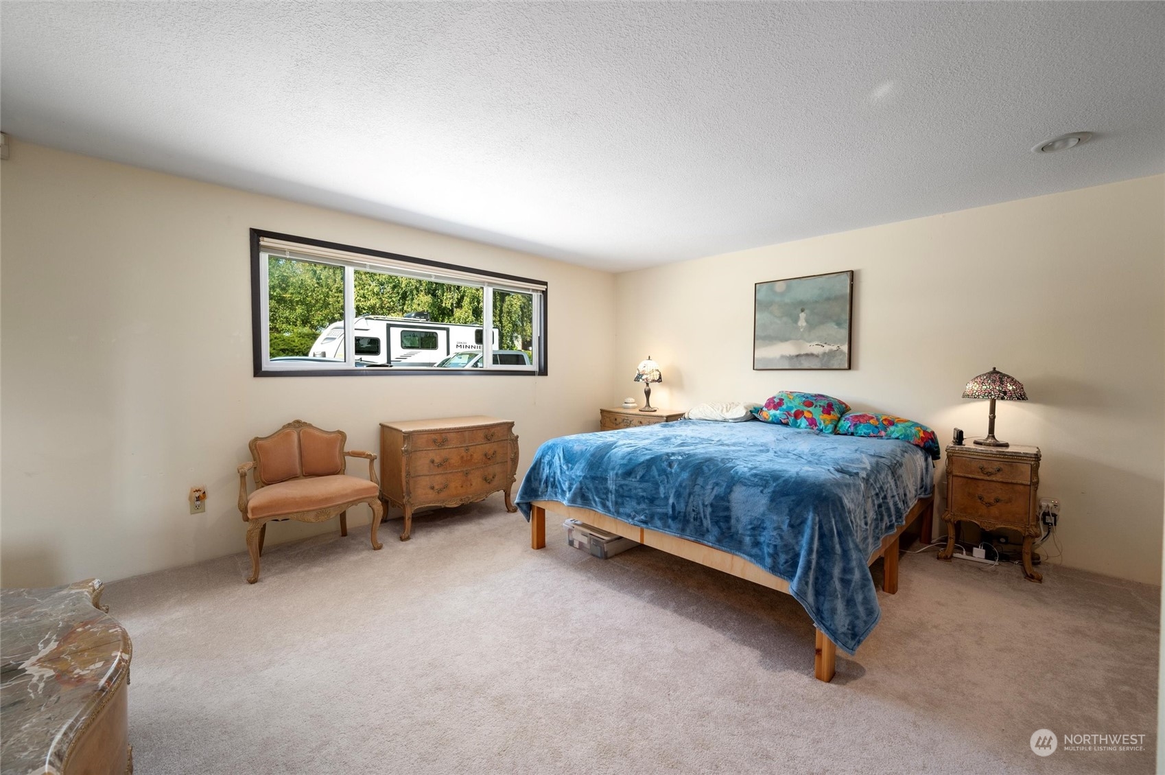 13622 Trumpeter Lane Mount Vernon, WA 98273 - Photo 26 of 40 a bedroom with a bed and a couch