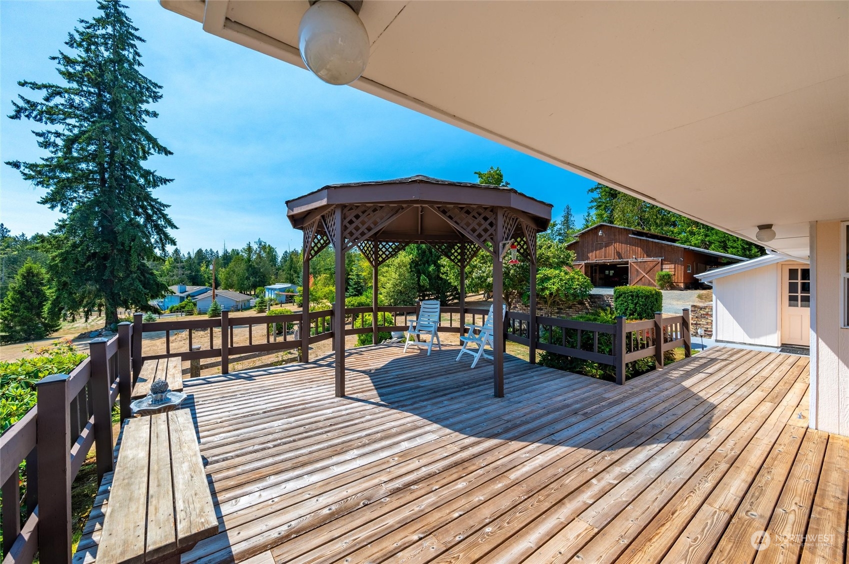 13622 Trumpeter Lane Mount Vernon, WA 98273 - Photo 35 of 40 a view of a chairs and table on the wooden floor