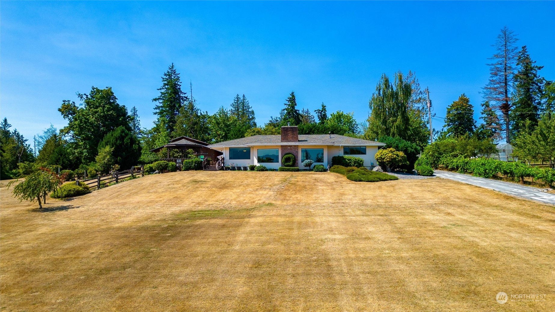 13622 Trumpeter Lane Mount Vernon, WA 98273 - Photo 40 of 40 a front view of a house with a yard