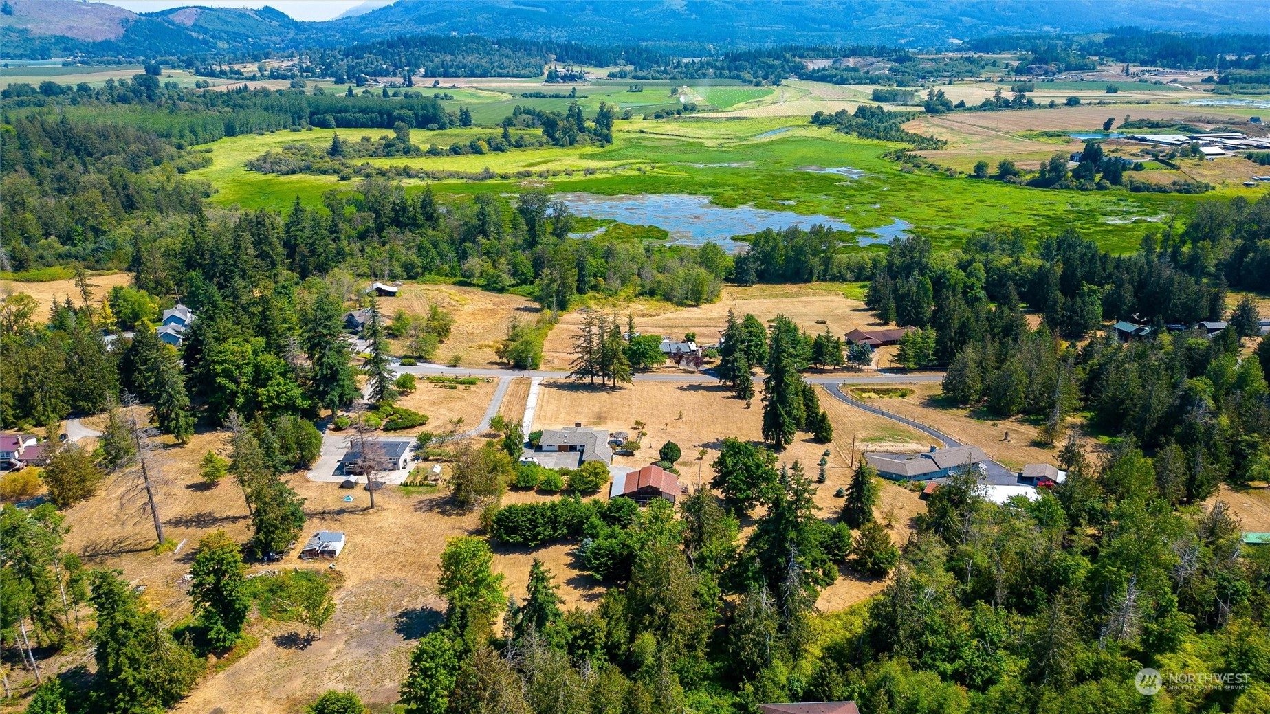 13622 Trumpeter Lane Mount Vernon, WA 98273 - Photo 4 of 40 an aerial view of residential houses with outdoor space and river
