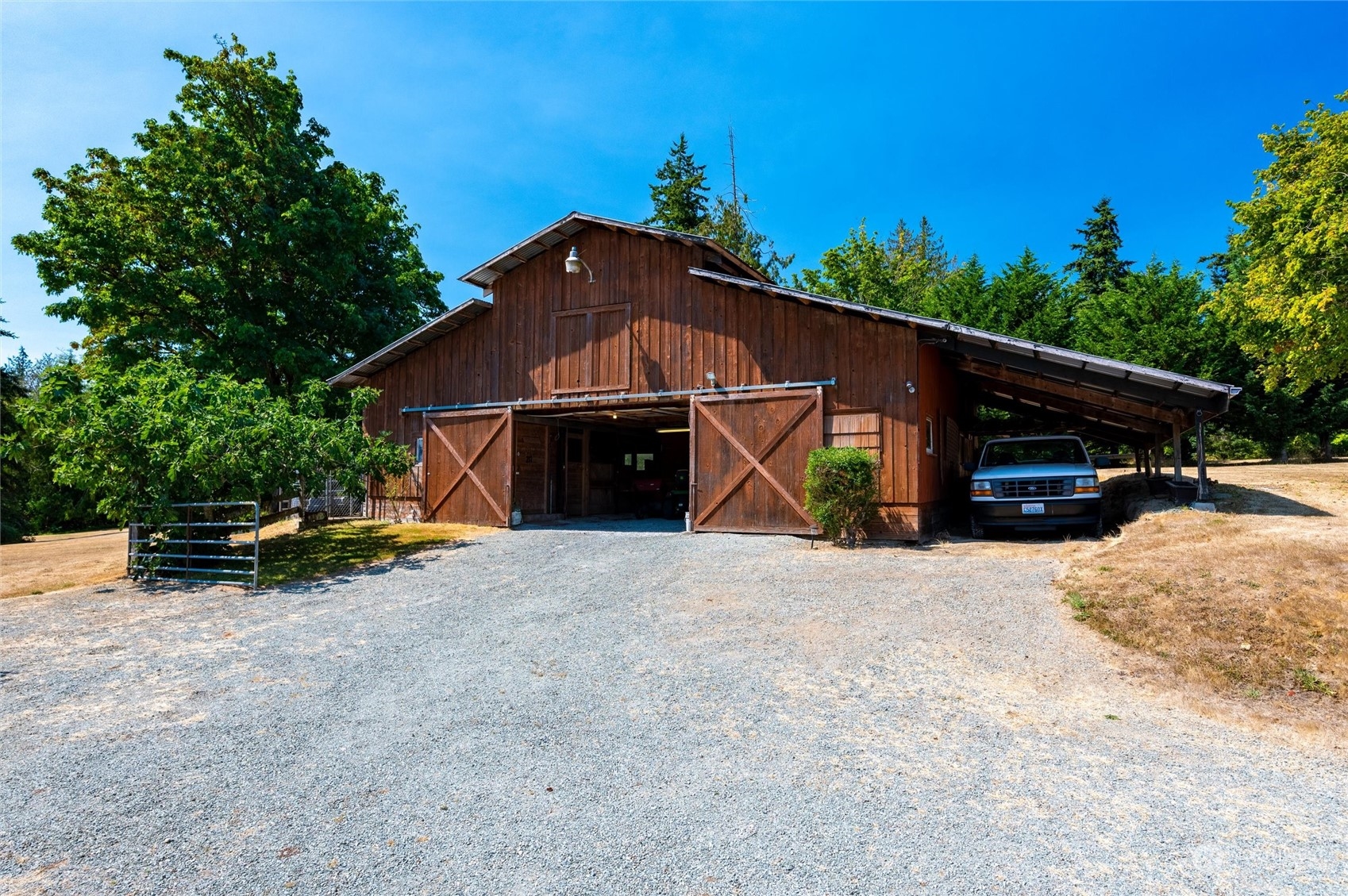 13622 Trumpeter Lane Mount Vernon, WA 98273 - Photo 5 of 40 a view of a barn in the middle of a yard