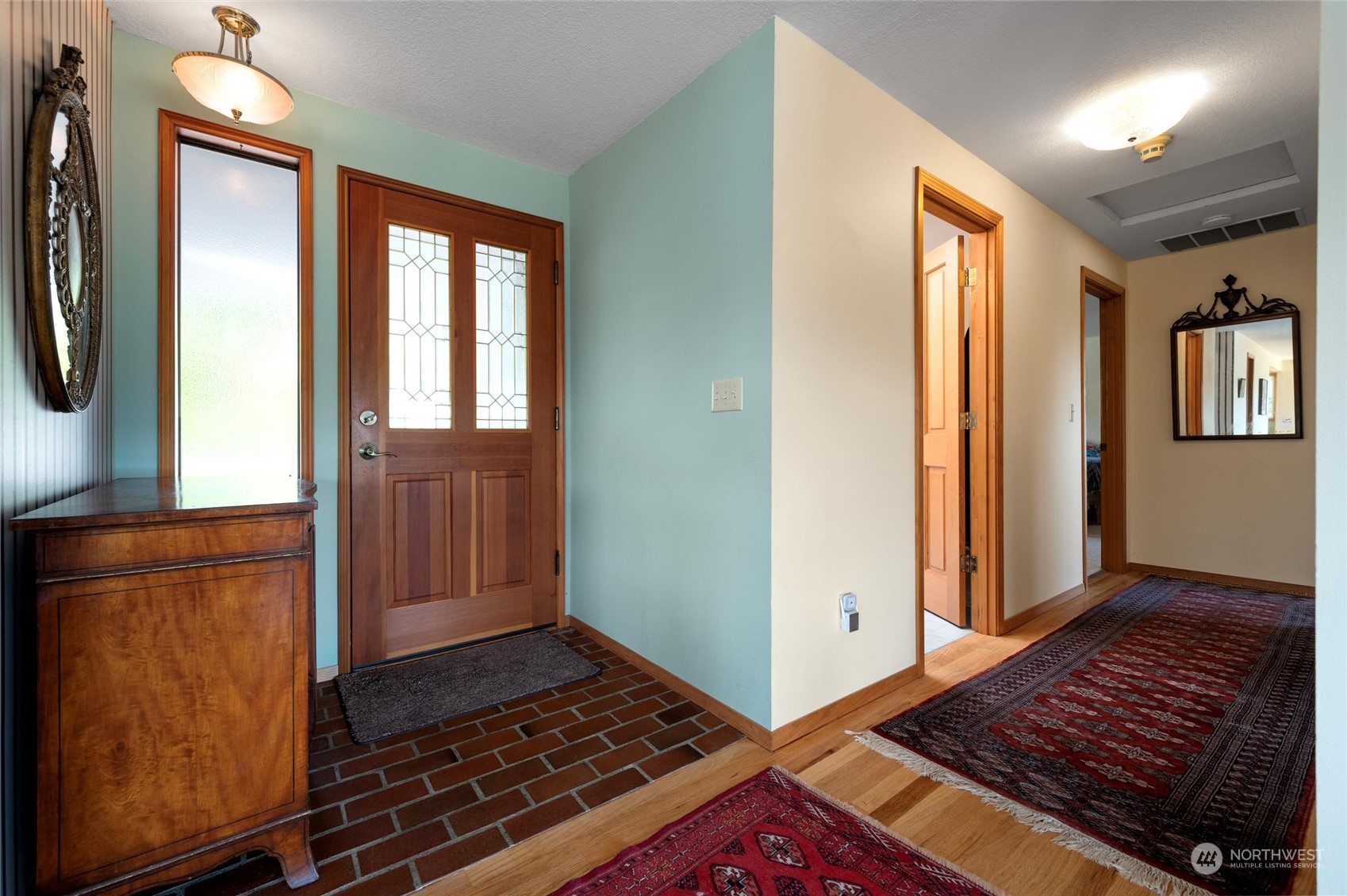 13622 Trumpeter Lane Mount Vernon, WA 98273 - Photo 10 of 40 a view of a livingroom with wooden floor and windows