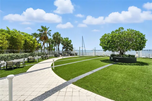 a view of a garden with a fountain