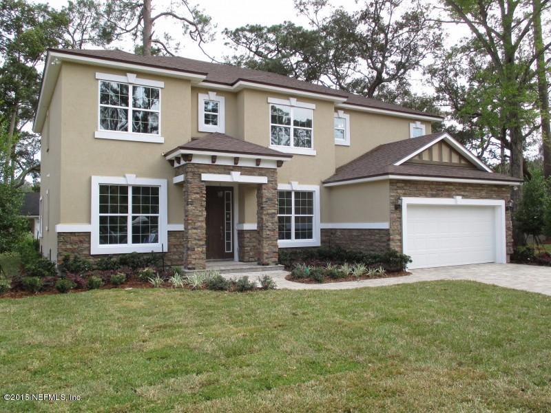 9694 Beauclerc Bluff Road Jacksonville, FL 32257 - Photo 3 of 21 a front view of a house with a yard and porch