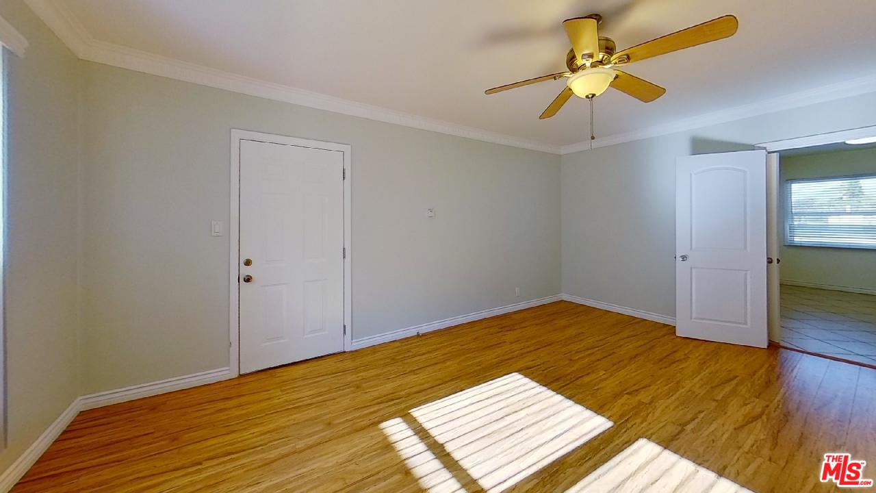 2027 Euclid Street, Unit E Santa Monica, CA 90405 - Photo 4 of 18 a view of empty room with wooden floor