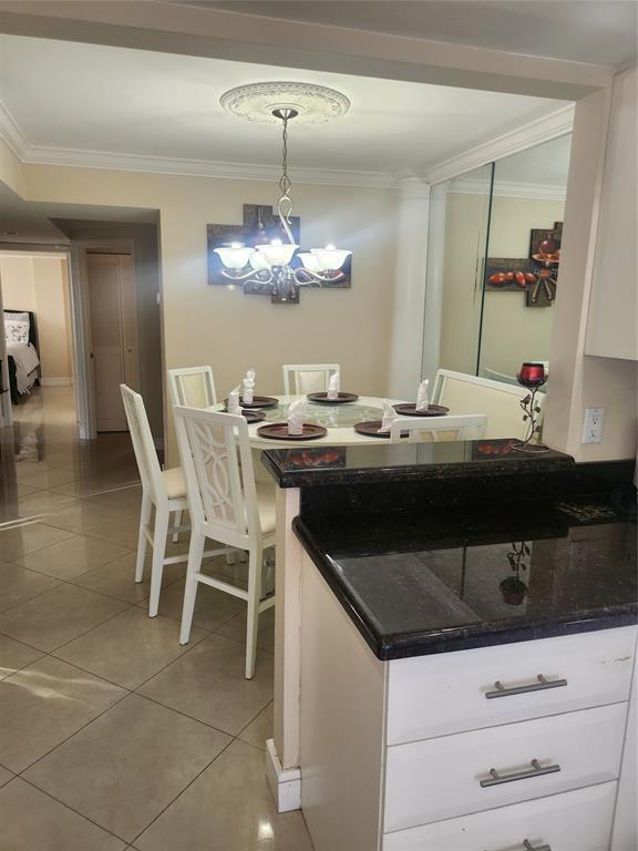 4160 Inverrary Drive, Unit 311 Lauderhill, FL 33319 - Photo 11 of 15 a kitchen with a sink and stove