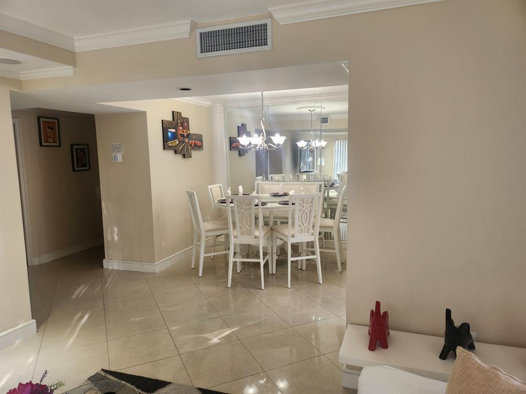 4160 Inverrary Drive, Unit 311 Lauderhill, FL 33319 - Photo 12 of 15 a view of a dining room with furniture