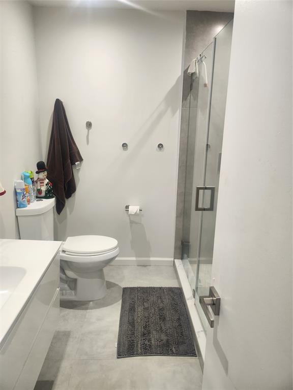 4160 Inverrary Drive, Unit 311 Lauderhill, FL 33319 - Photo 3 of 15 a bathroom with a toilet and a shower