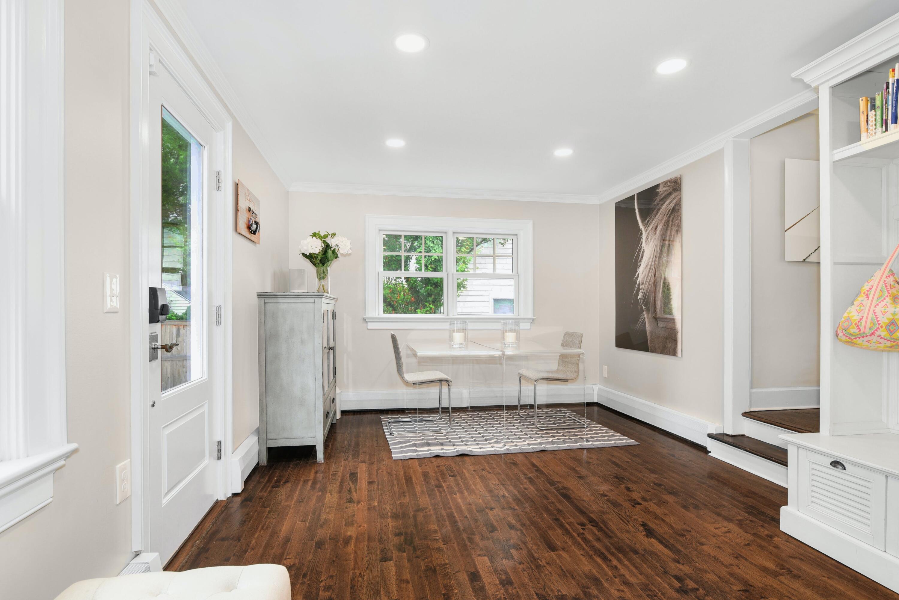13 Sunset Road Darien, CT 06820 - Photo 13 of 28 a living room with furniture and a large window