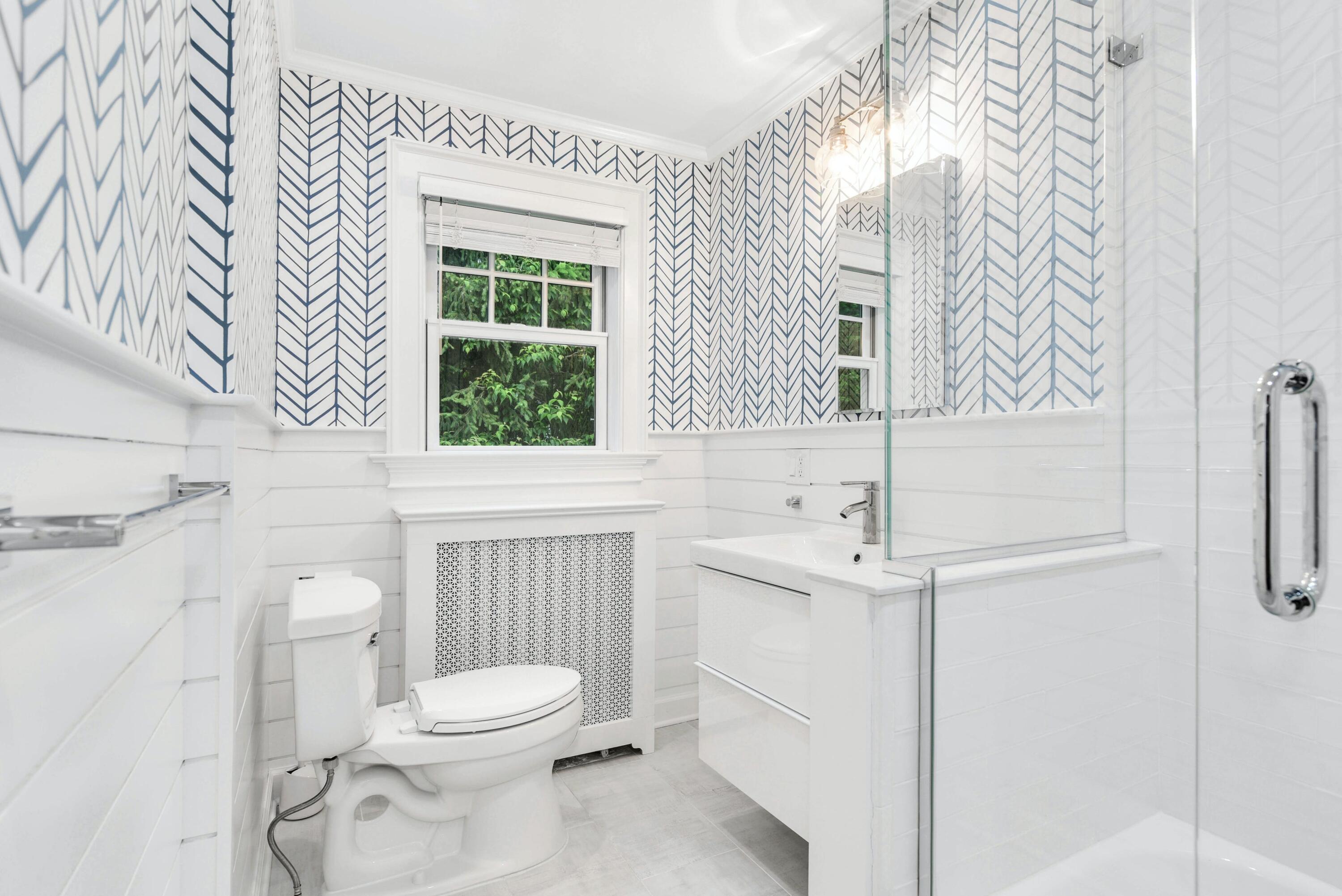 13 Sunset Road Darien, CT 06820 - Photo 21 of 28 a bathroom with a sink a toilet and shower