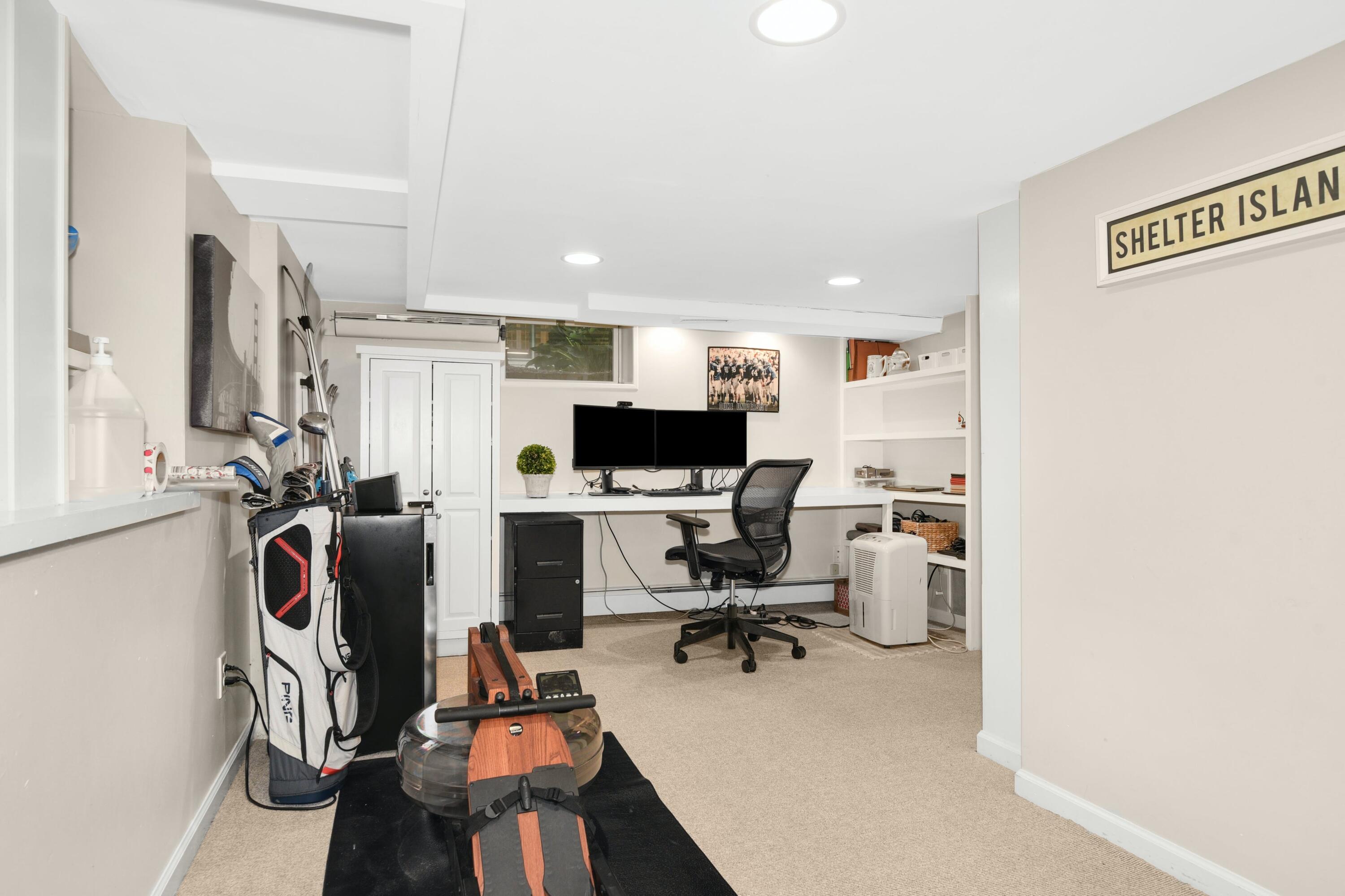 13 Sunset Road Darien, CT 06820 - Photo 22 of 28 a view of a livingroom with workspace and a window