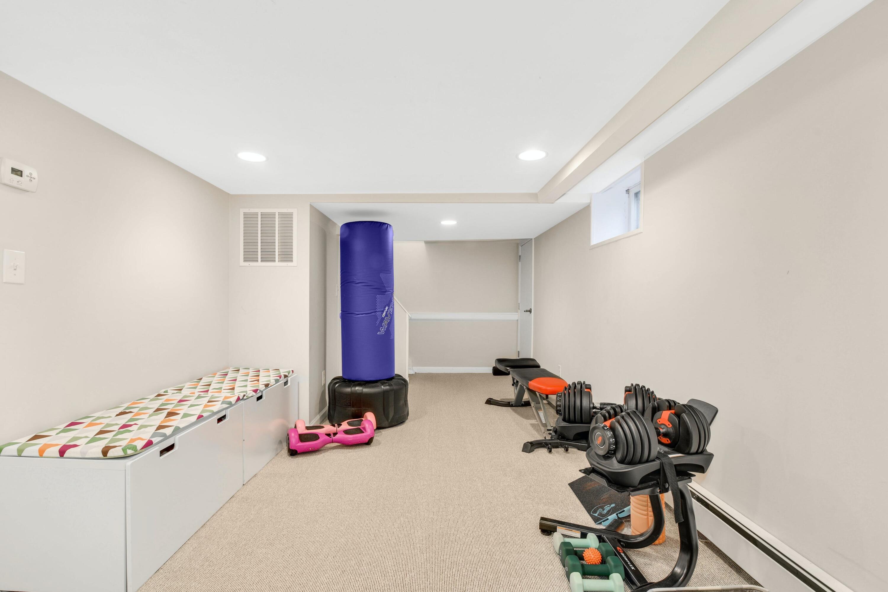 13 Sunset Road Darien, CT 06820 - Photo 23 of 28 a view of a room with gym equipment