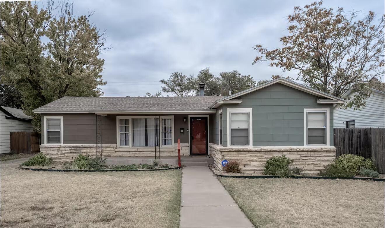 2816 37th Street Lubbock, TX 79413 - Photo 1 of 19 front view of house with a yard