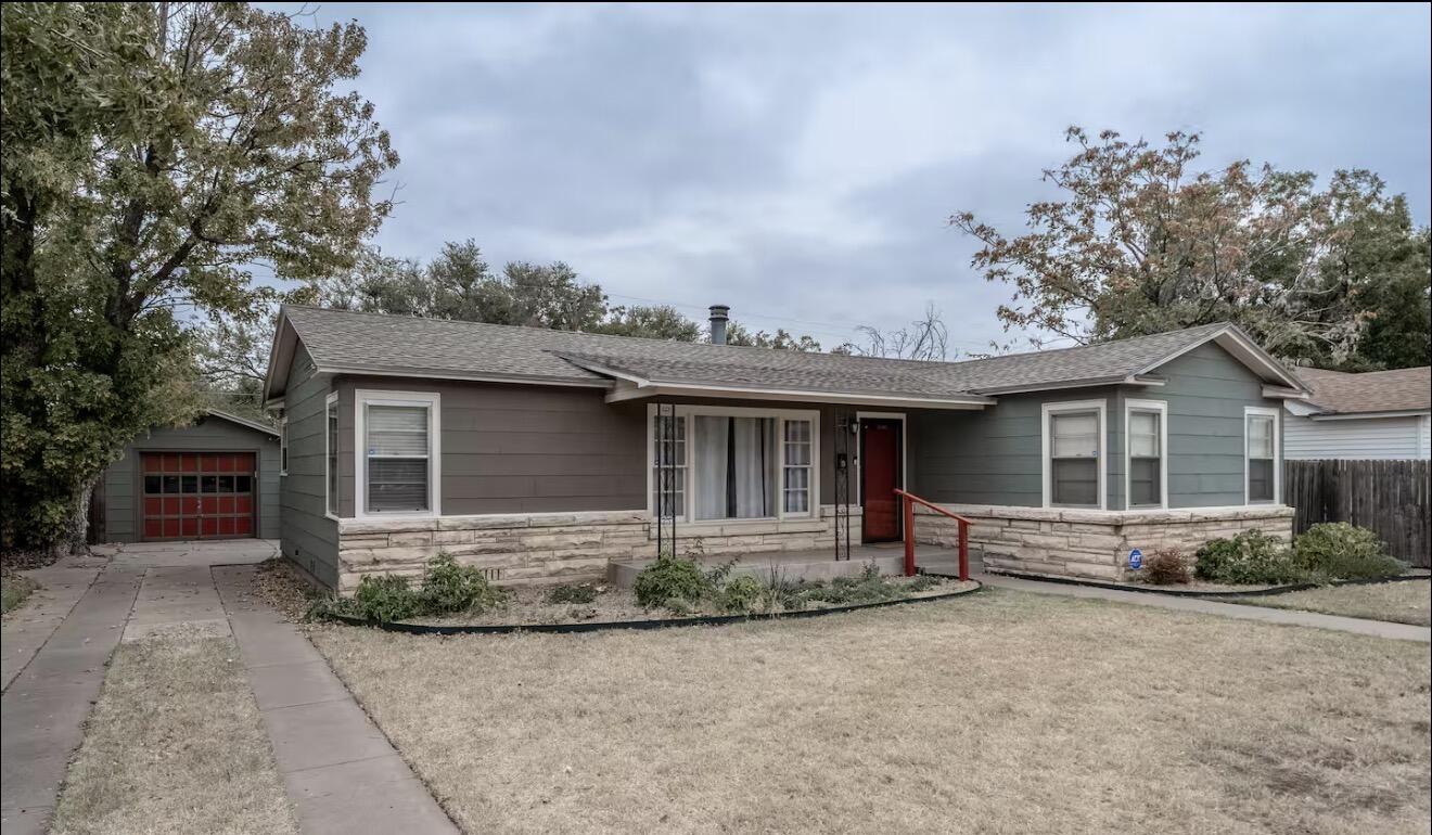 2816 37th Street Lubbock, TX 79413 - Photo 2 of 19 front view of house with a yard