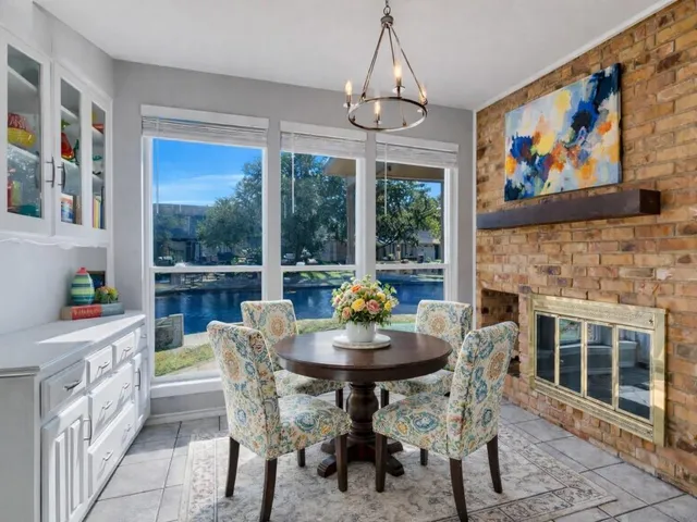 a bed room with bed and a large window