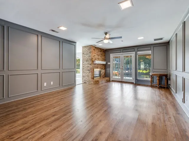 a living room with a large window
