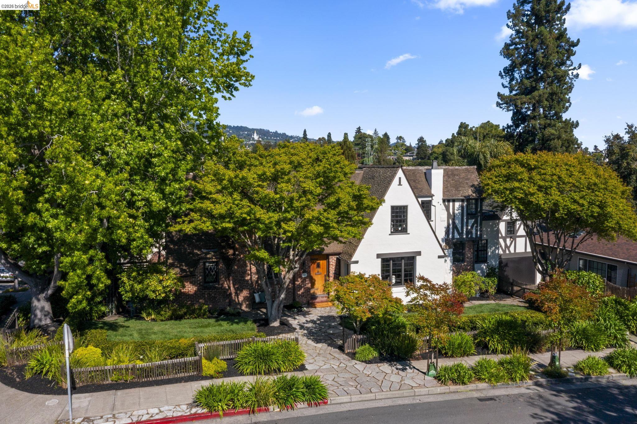 1087 Hubert Road Oakland, CA 94610 - Photo 63 of 67 Tudor-style exterior with white stucco and dark timber detailing