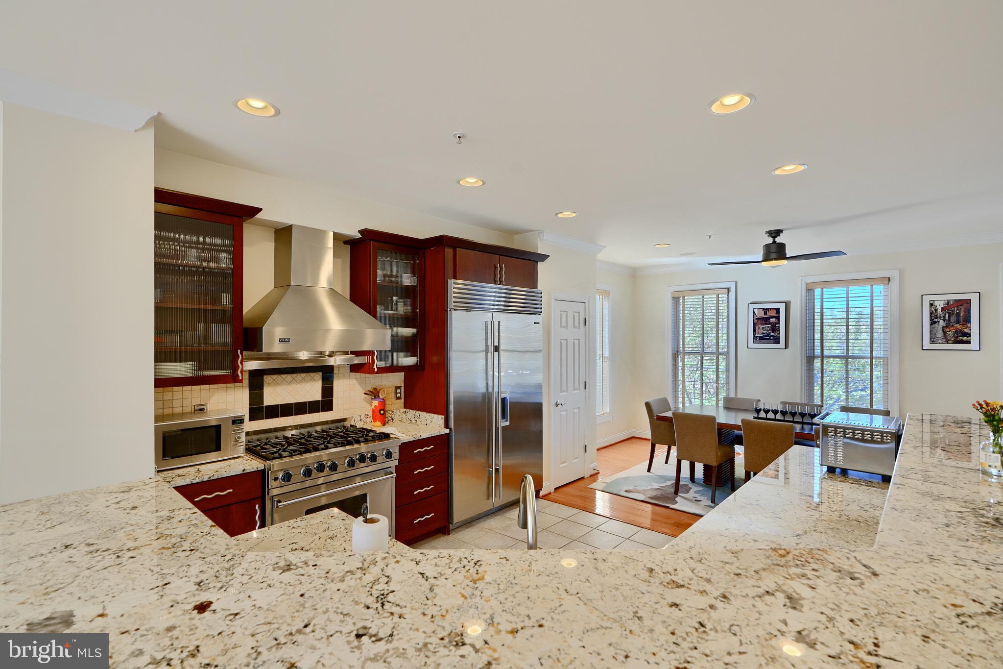 1221 Dockside Circle Baltimore, MD 21224 - Photo 17 of 57 a room with furniture and a flat screen tv