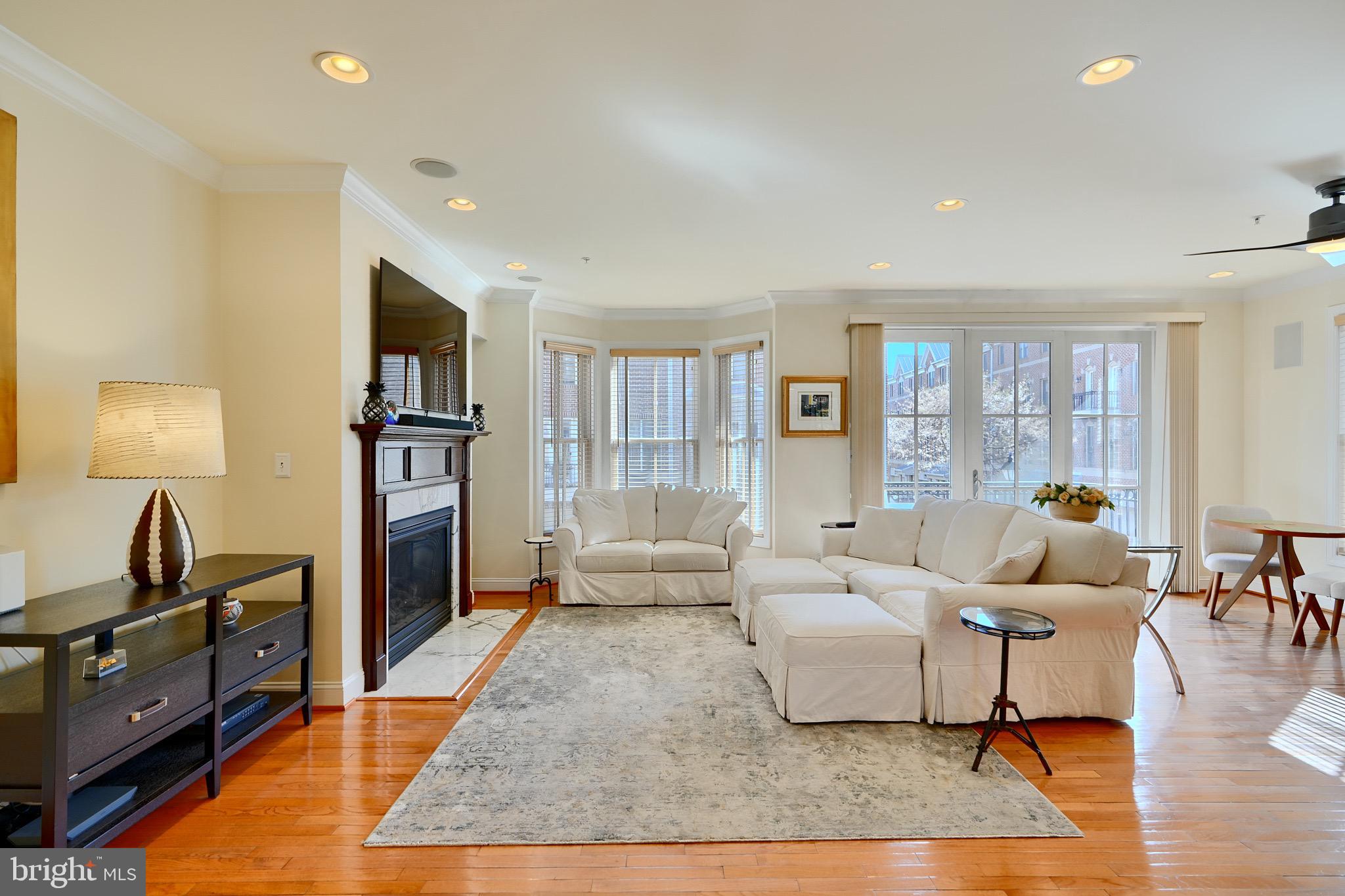 1221 Dockside Circle Baltimore, MD 21224 - Photo 22 of 57 a living room with furniture and a flat screen tv