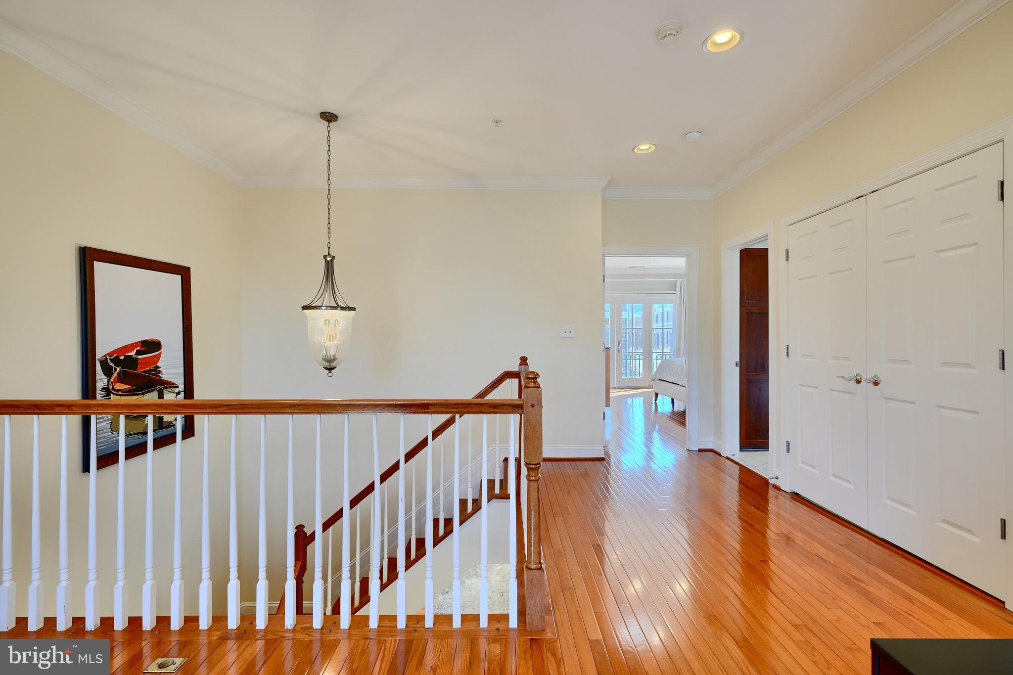 1221 Dockside Circle Baltimore, MD 21224 - Photo 30 of 57 a view of a hallway with wooden floor
