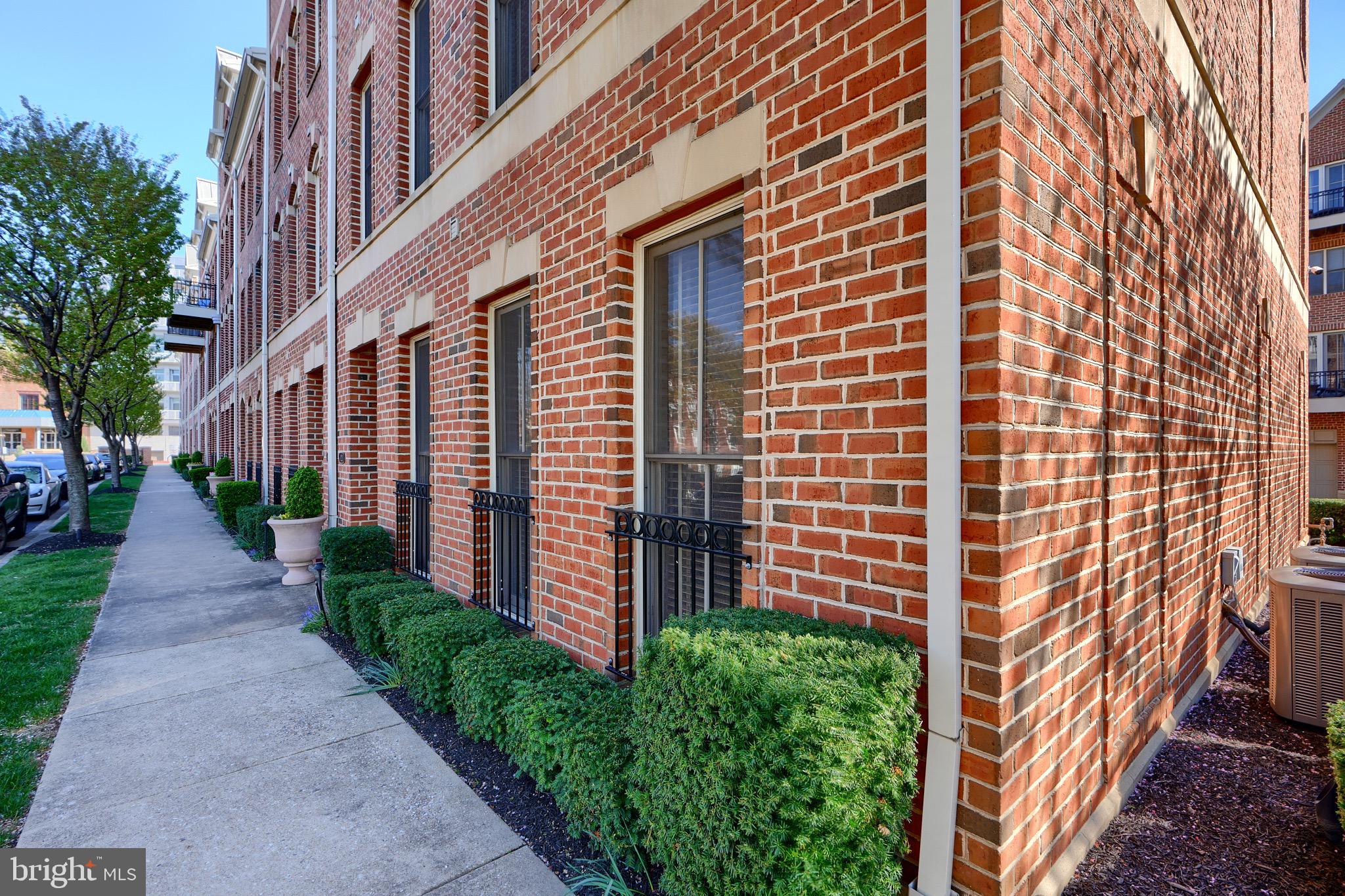 1221 Dockside Circle Baltimore, MD 21224 - Photo 3 of 57 a view of a building with a garden
