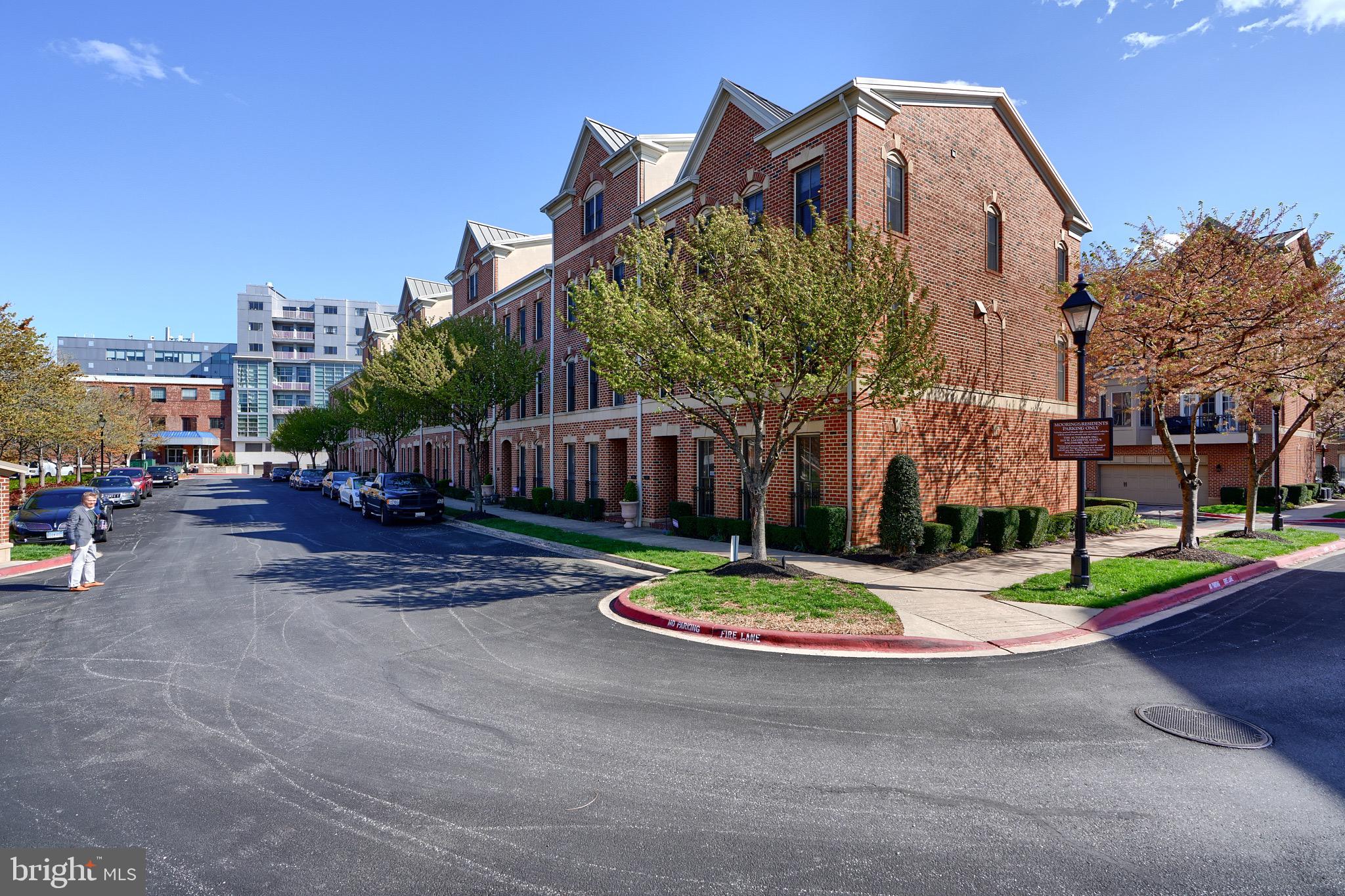 1221 Dockside Circle Baltimore, MD 21224 - Photo 4 of 57 a sign board with buildings in the background