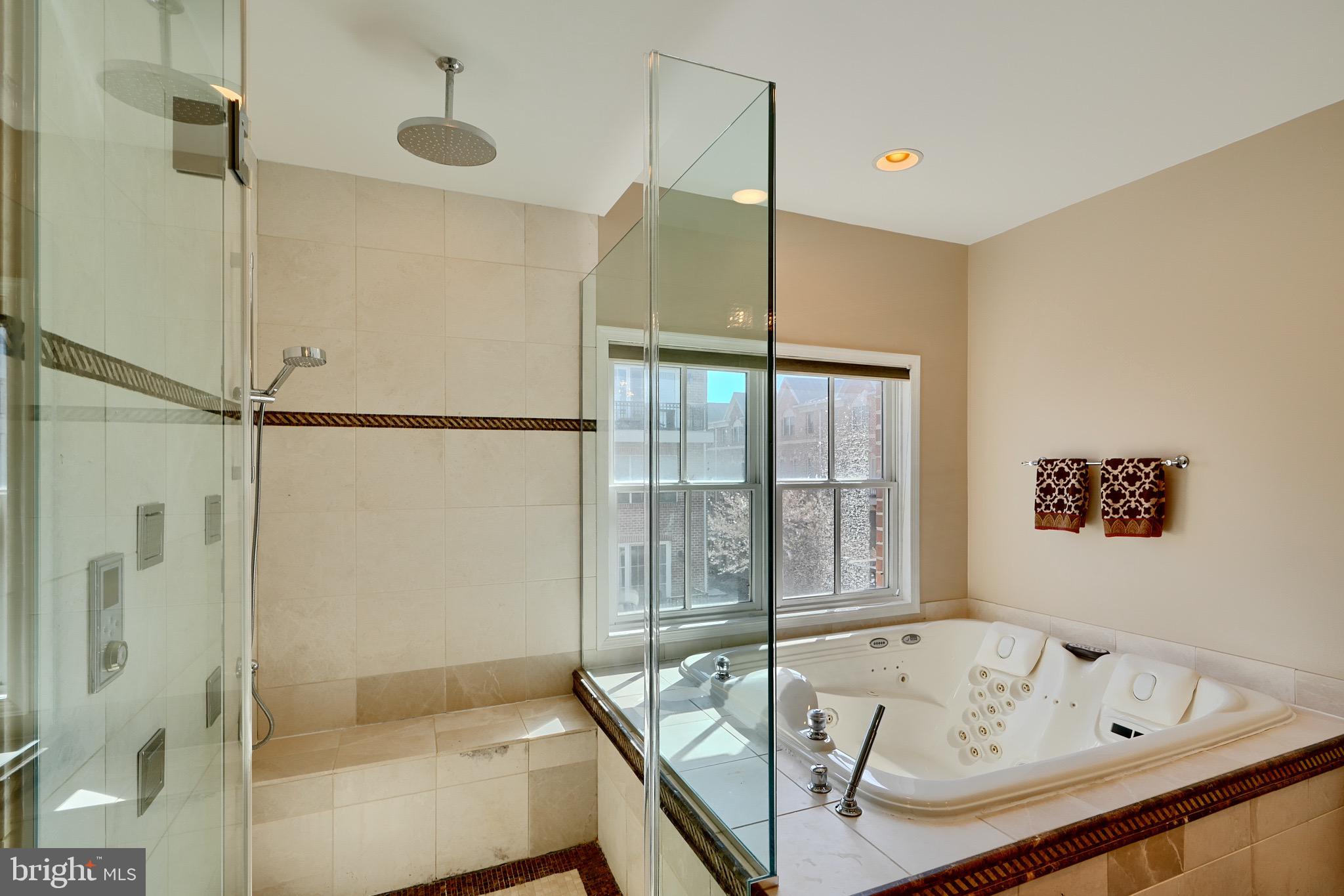 1221 Dockside Circle Baltimore, MD 21224 - Photo 46 of 57 a bathroom with a tub and a window