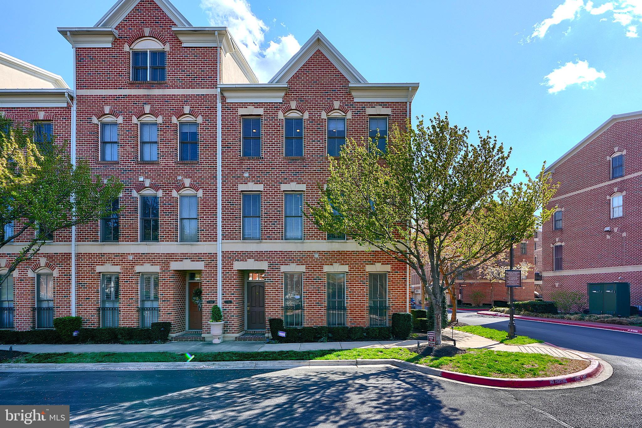 1221 Dockside Circle Baltimore, MD 21224 - Photo 5 of 57 a front view of a house with a yard