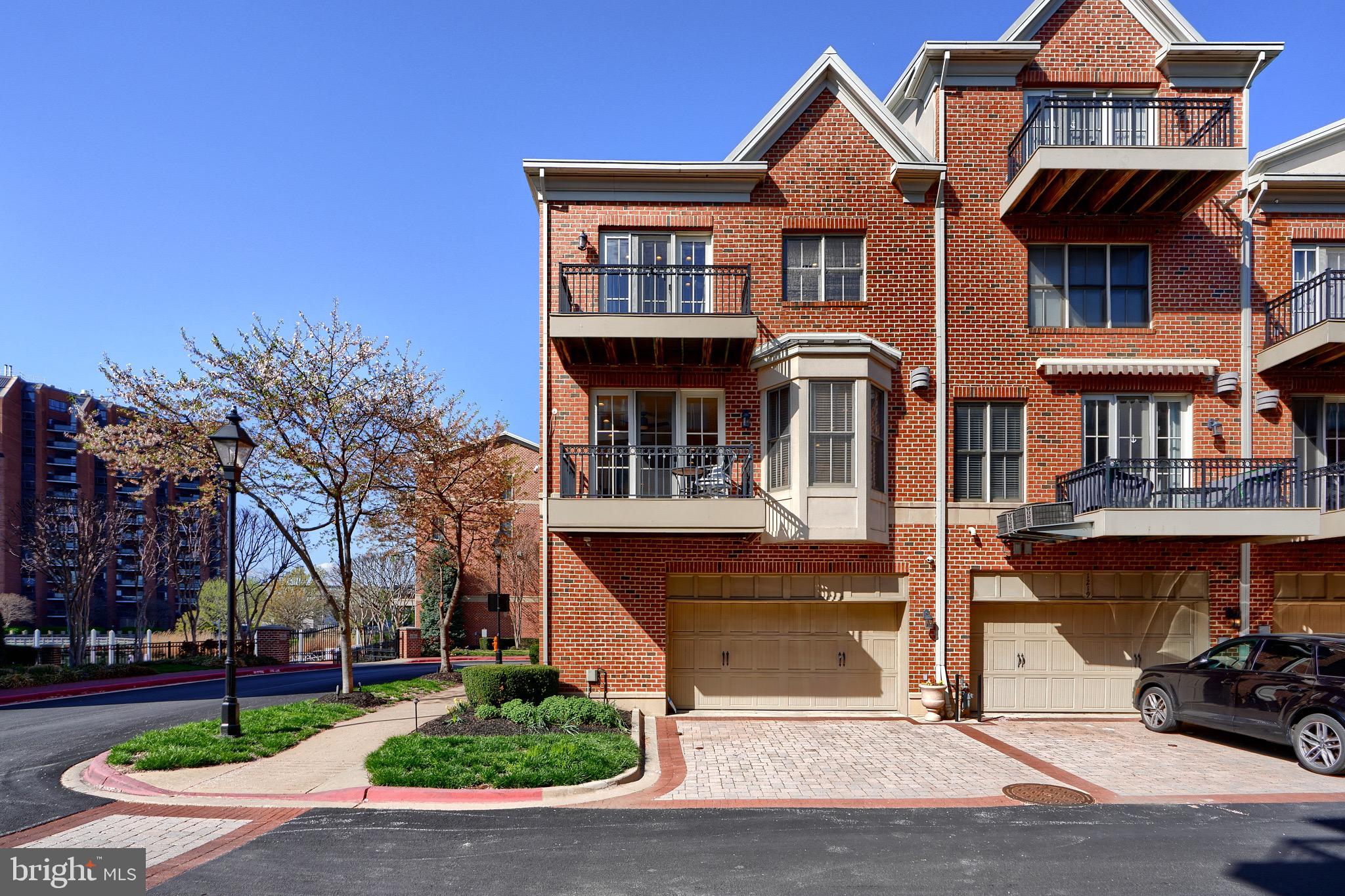 1221 Dockside Circle Baltimore, MD 21224 - Photo 56 of 57 a front view of a house with a yard