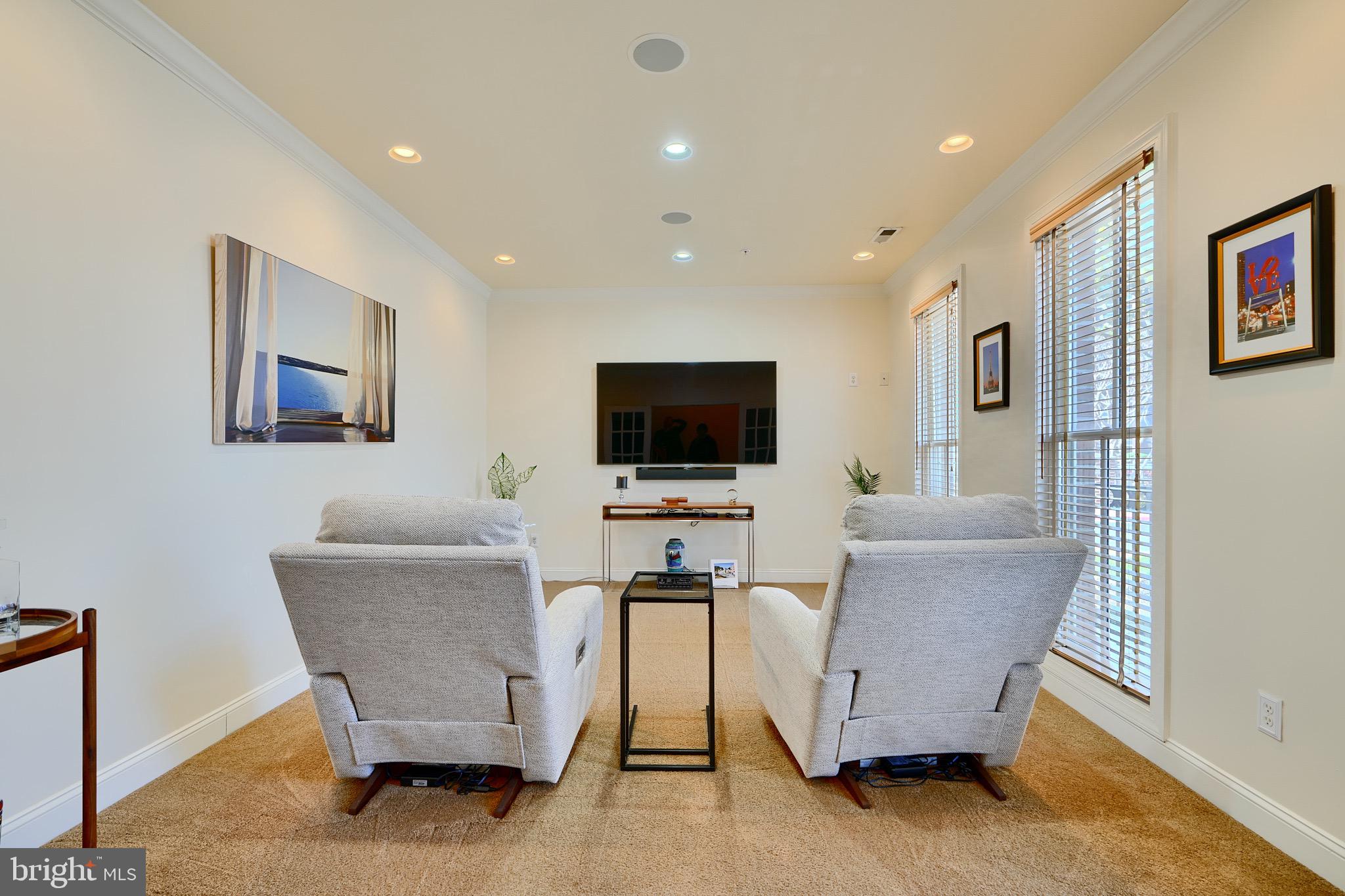 1221 Dockside Circle Baltimore, MD 21224 - Photo 7 of 57 a living room with furniture and a flat screen tv