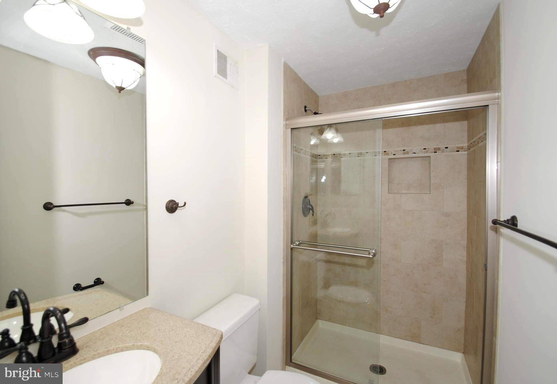 579 Quaker Ridge Court Arnold, MD 21012 - Photo 16 of 30 Revamped Granite / Inlaid Tile Master Bath