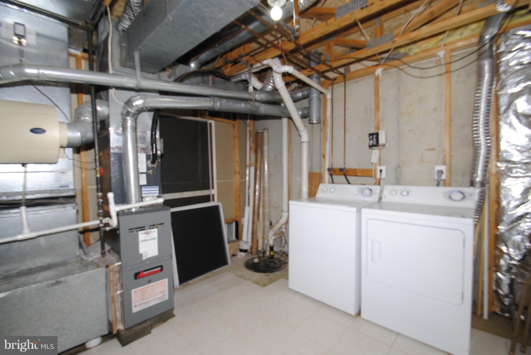 579 Quaker Ridge Court Arnold, MD 21012 - Photo 24 of 30 Lower Level Laundry Area / NEW 2017 HVAC