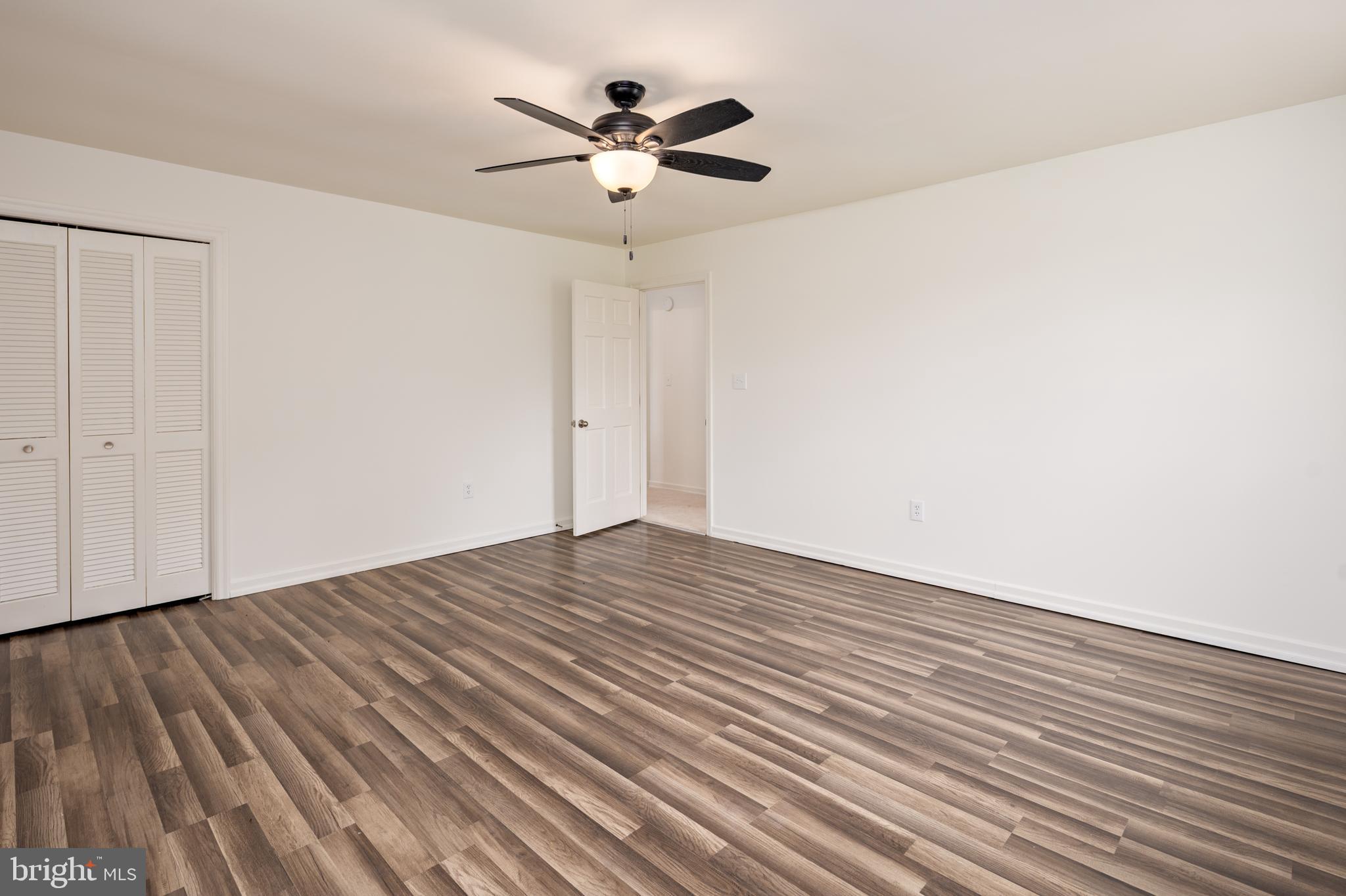324 Flat Iron Square Road Church Hill, MD 21623 - Photo 32 of 47 wooden floor in an empty room