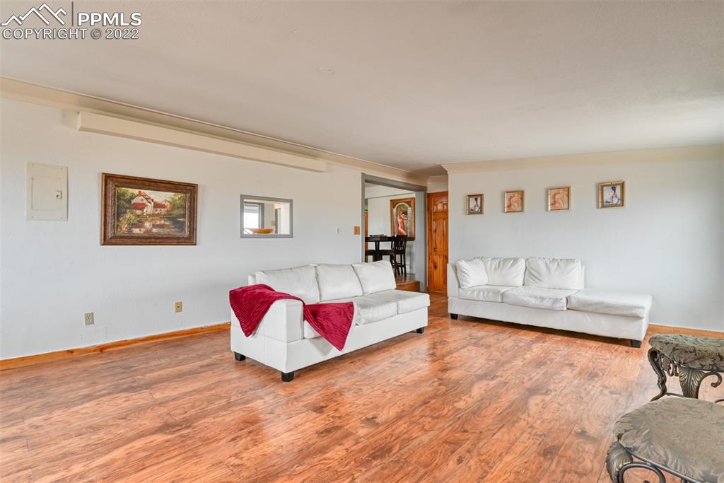 6175 Mulberry Road Calhan, CO 80808 - Photo 12 of 46 a living room with furniture window and couch