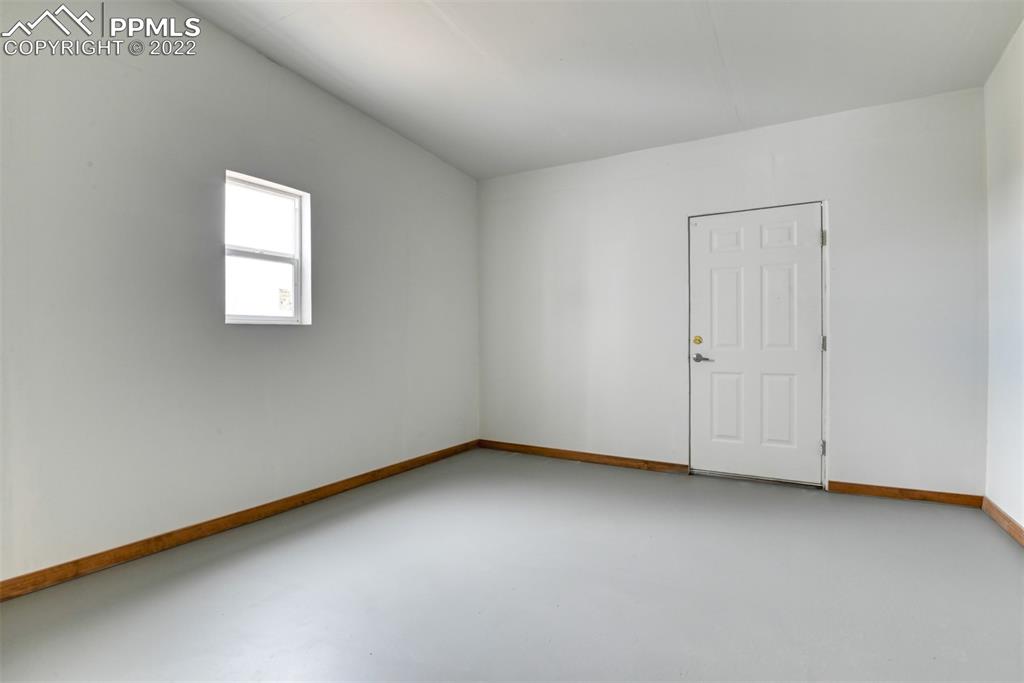6175 Mulberry Road Calhan, CO 80808 - Photo 19 of 46 an empty room with a window
