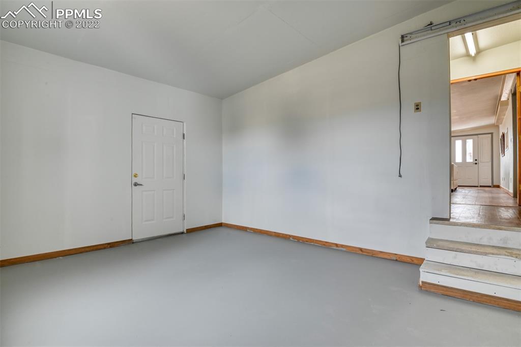 6175 Mulberry Road Calhan, CO 80808 - Photo 20 of 46 a view of an empty room with a window