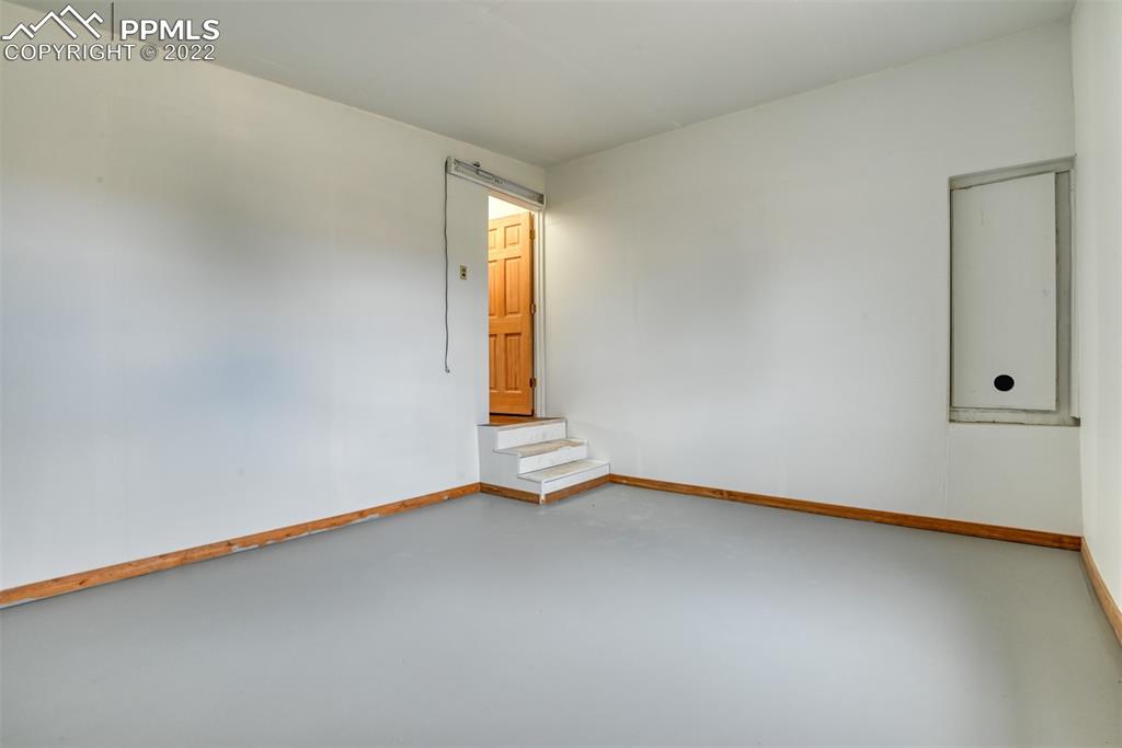6175 Mulberry Road Calhan, CO 80808 - Photo 21 of 46 a view of an empty room and window