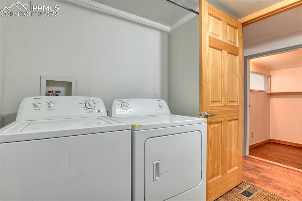6175 Mulberry Road Calhan, CO 80808 - Photo 33 of 46 a utility room with dryer and washer