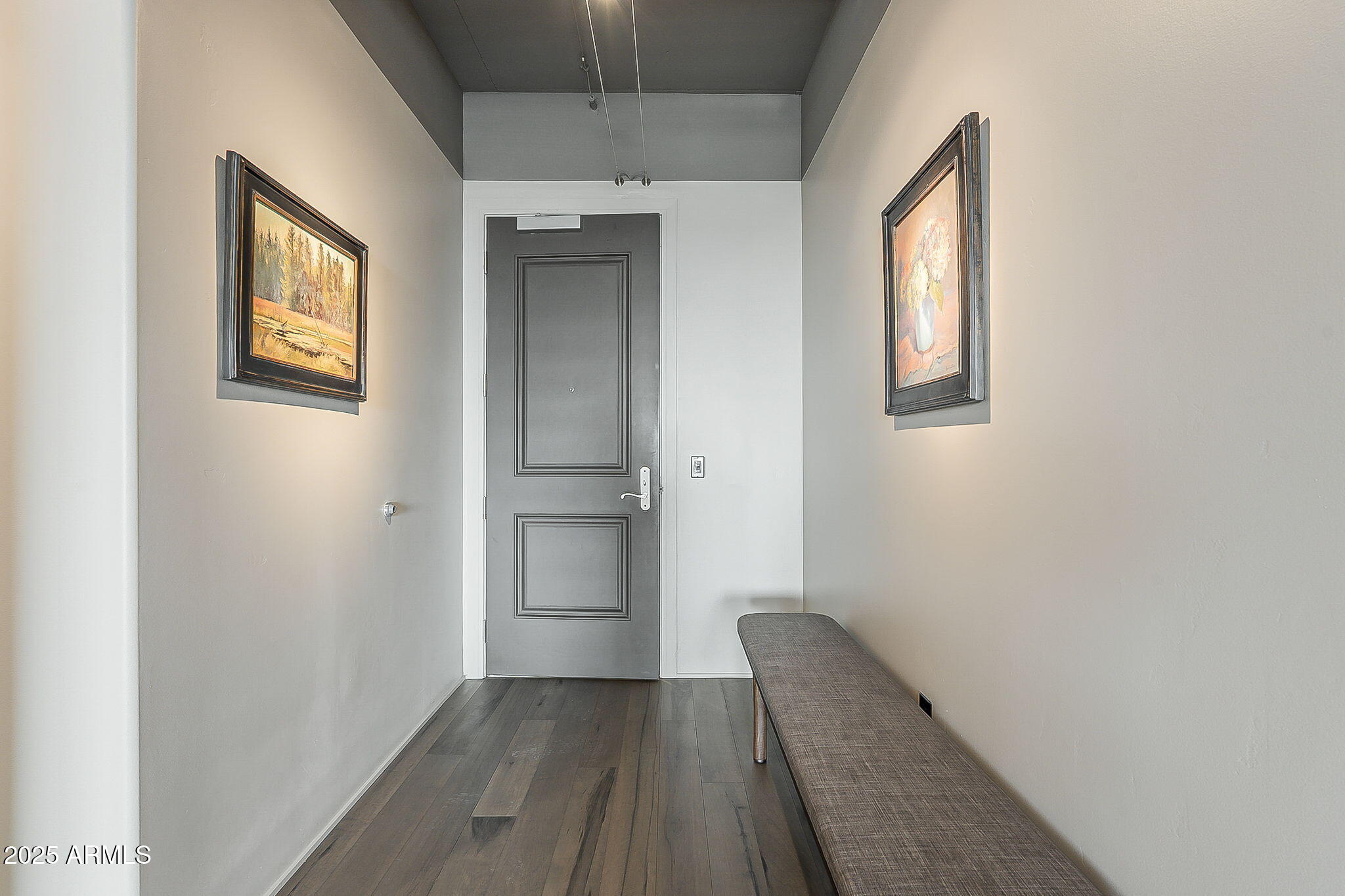 2211 East Camelback Road, Unit 605 Phoenix, AZ 85016 - Photo 11 of 56 a view of hallway with wooden floor
