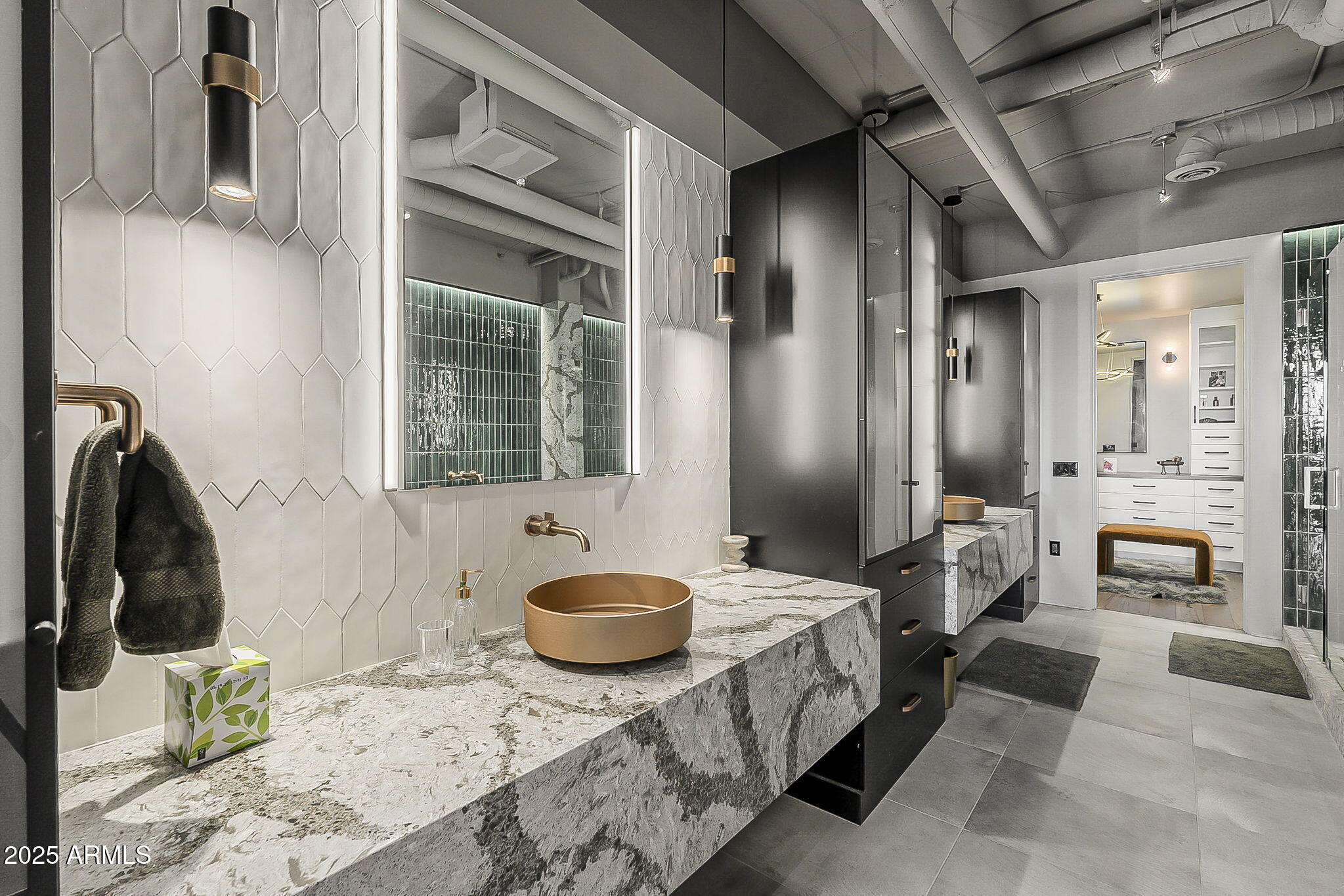 2211 East Camelback Road, Unit 605 Phoenix, AZ 85016 - Photo 35 of 56 a spacious bathroom with a granite countertop tub and a sink