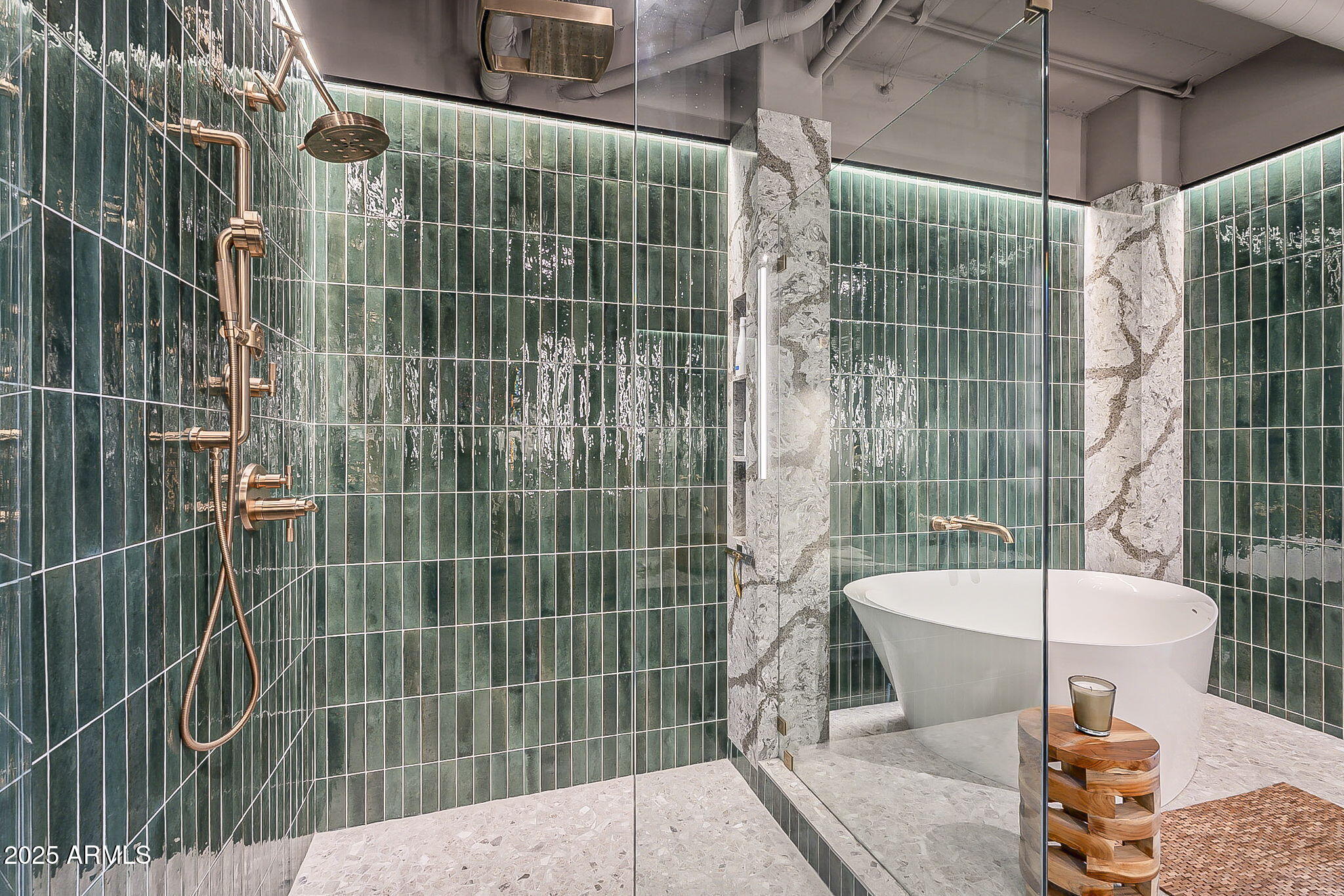2211 East Camelback Road, Unit 605 Phoenix, AZ 85016 - Photo 38 of 56 a bathroom with a shower toilet and sink